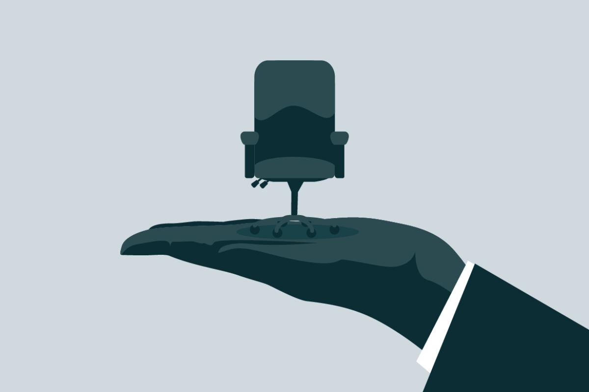 Office chair in a human palm