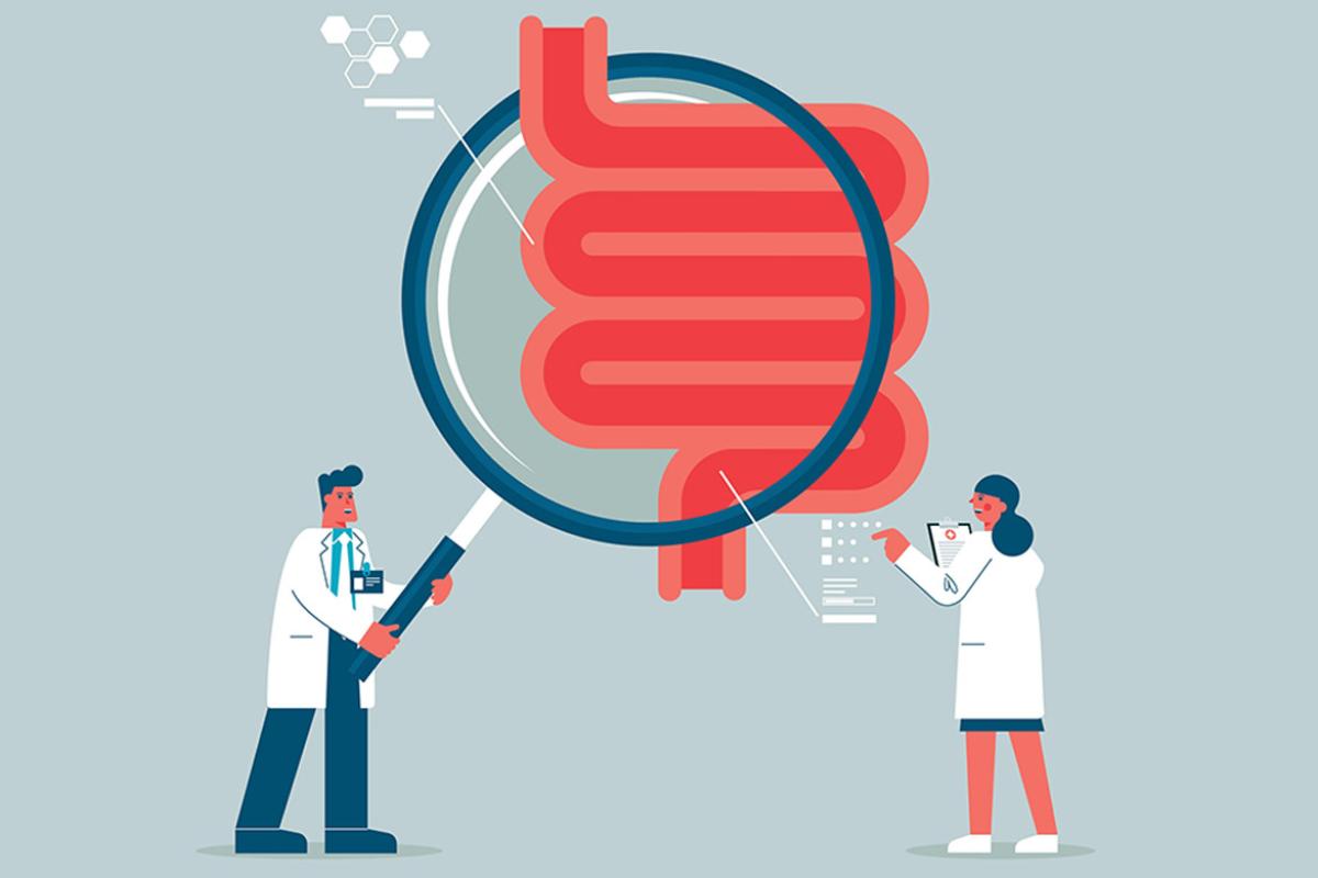 Team of doctors hold giant magnifying glass over human digestive system