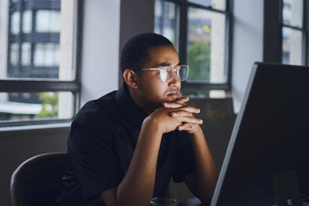 Young businessperson working on a laptop computer