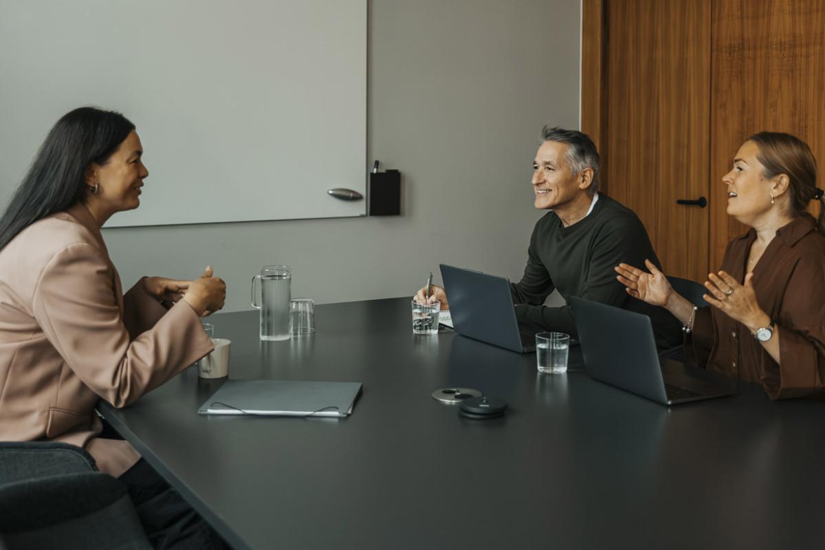 Interview taking place in office meeting room