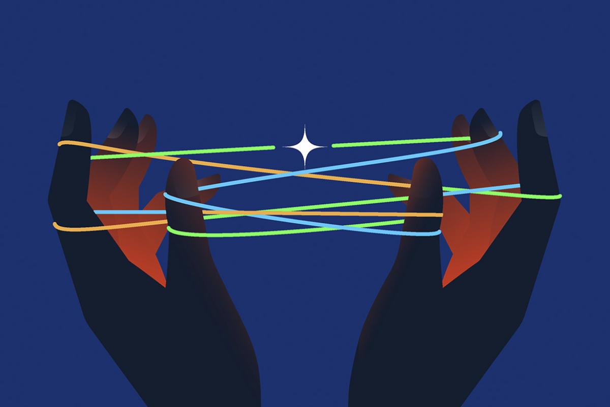 Hands holding string in cat's cradle