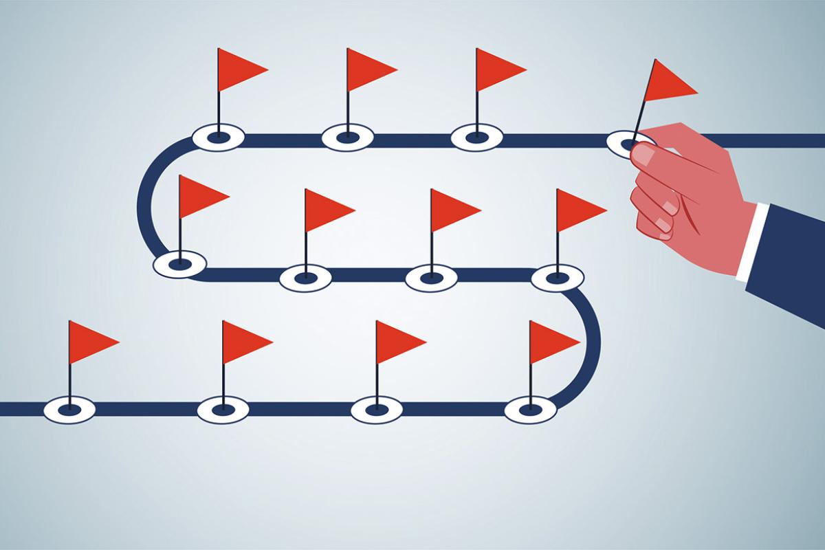 Winding road with red flags
