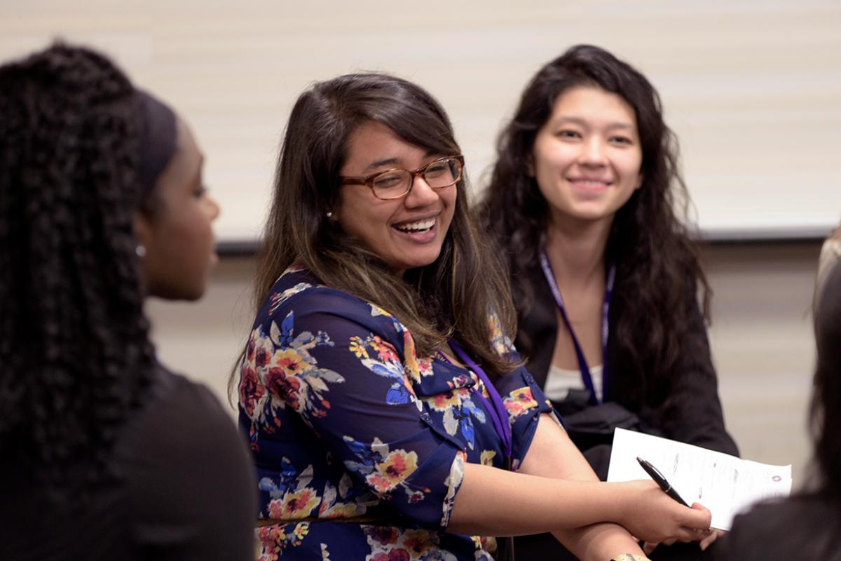 Three smiling members of the Minority Affairs Section at their Annual Meeting.