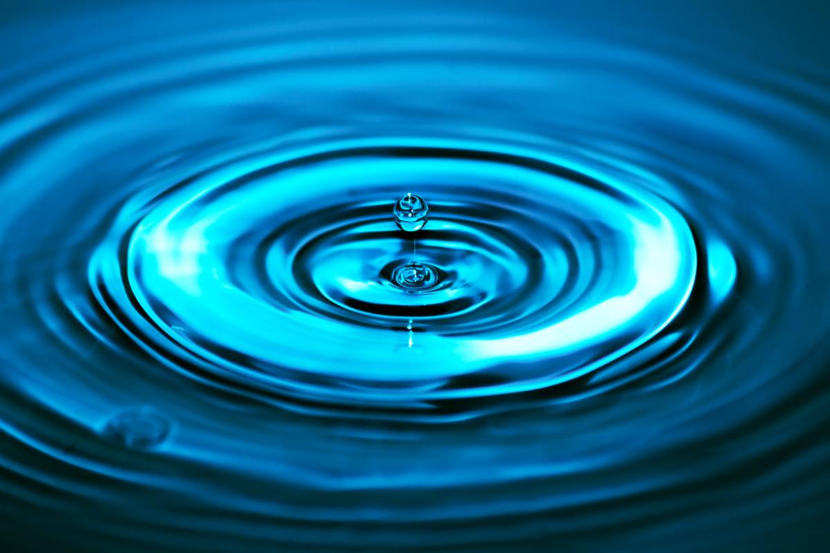 Ripple in a pool of water.