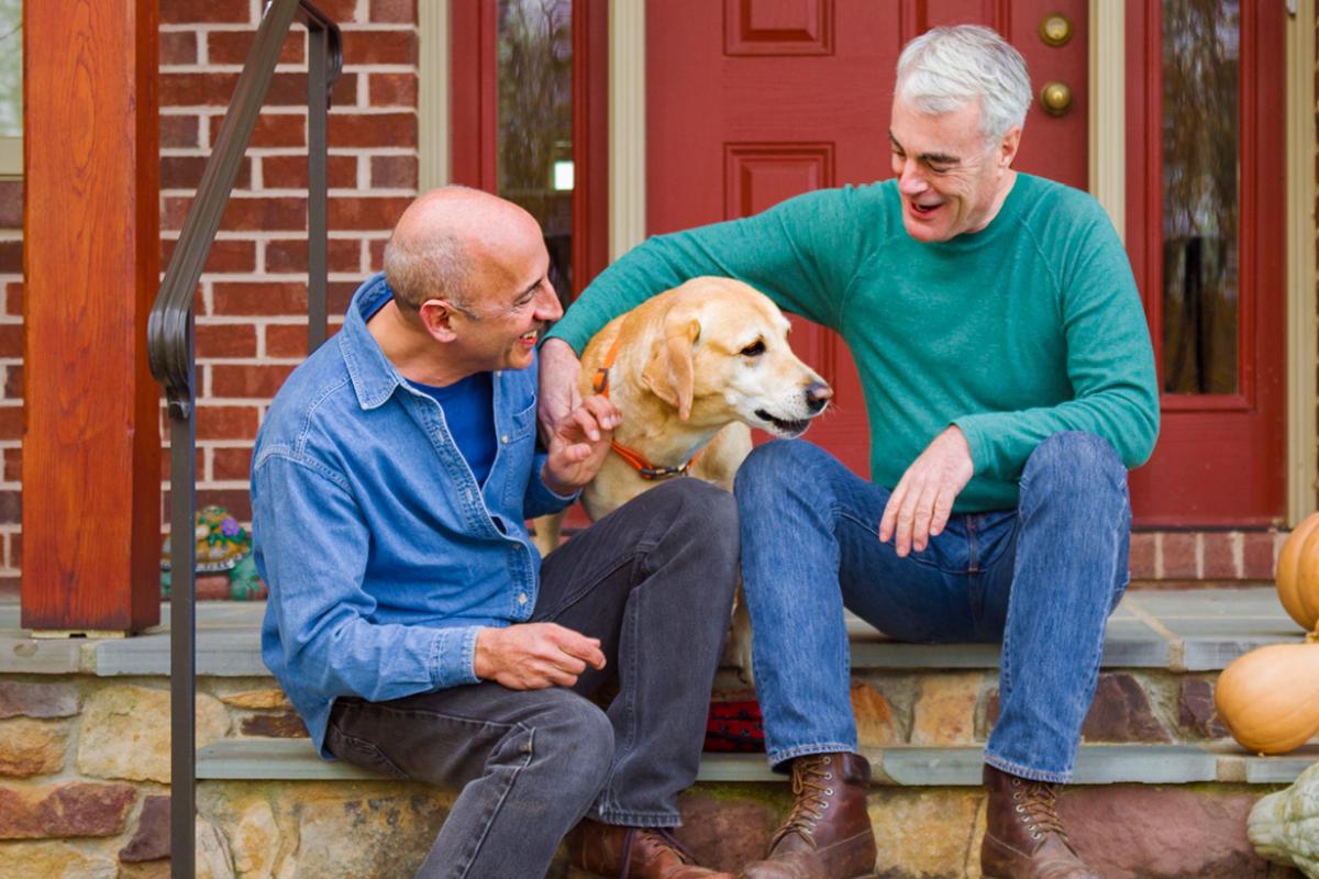 LGBTQ couple with their dog. 