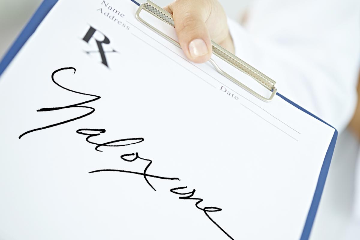 Prescription pad with naloxone written on it. 