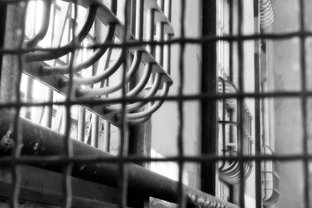 Prison bars covering windows. 