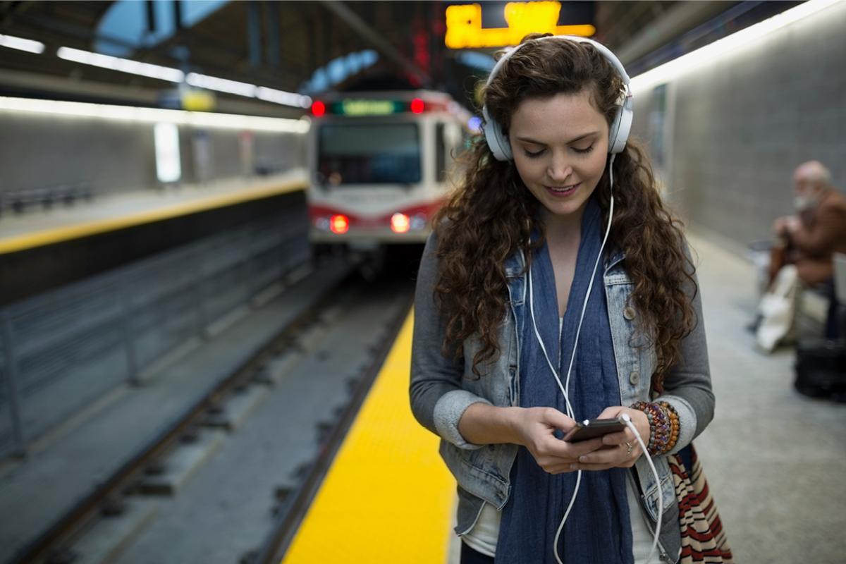 Commuter listening to a podcast. 