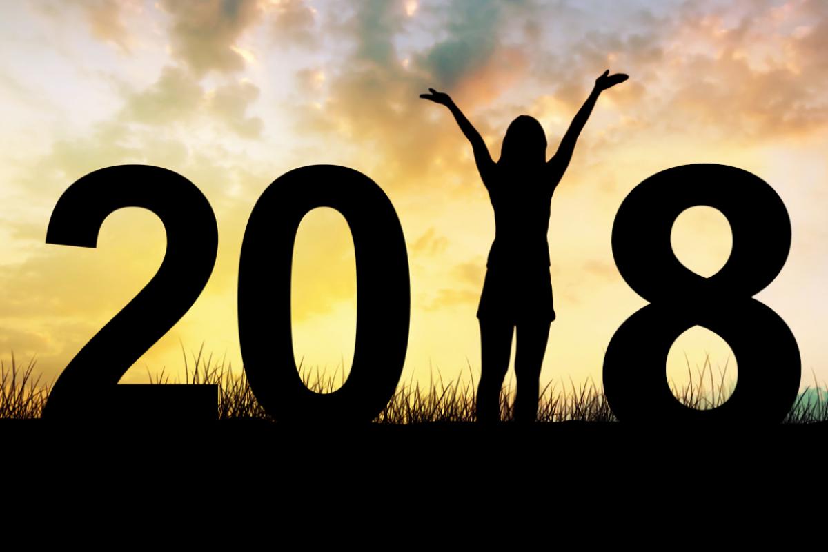 Happy New Year 2018 with woman in the middle. 