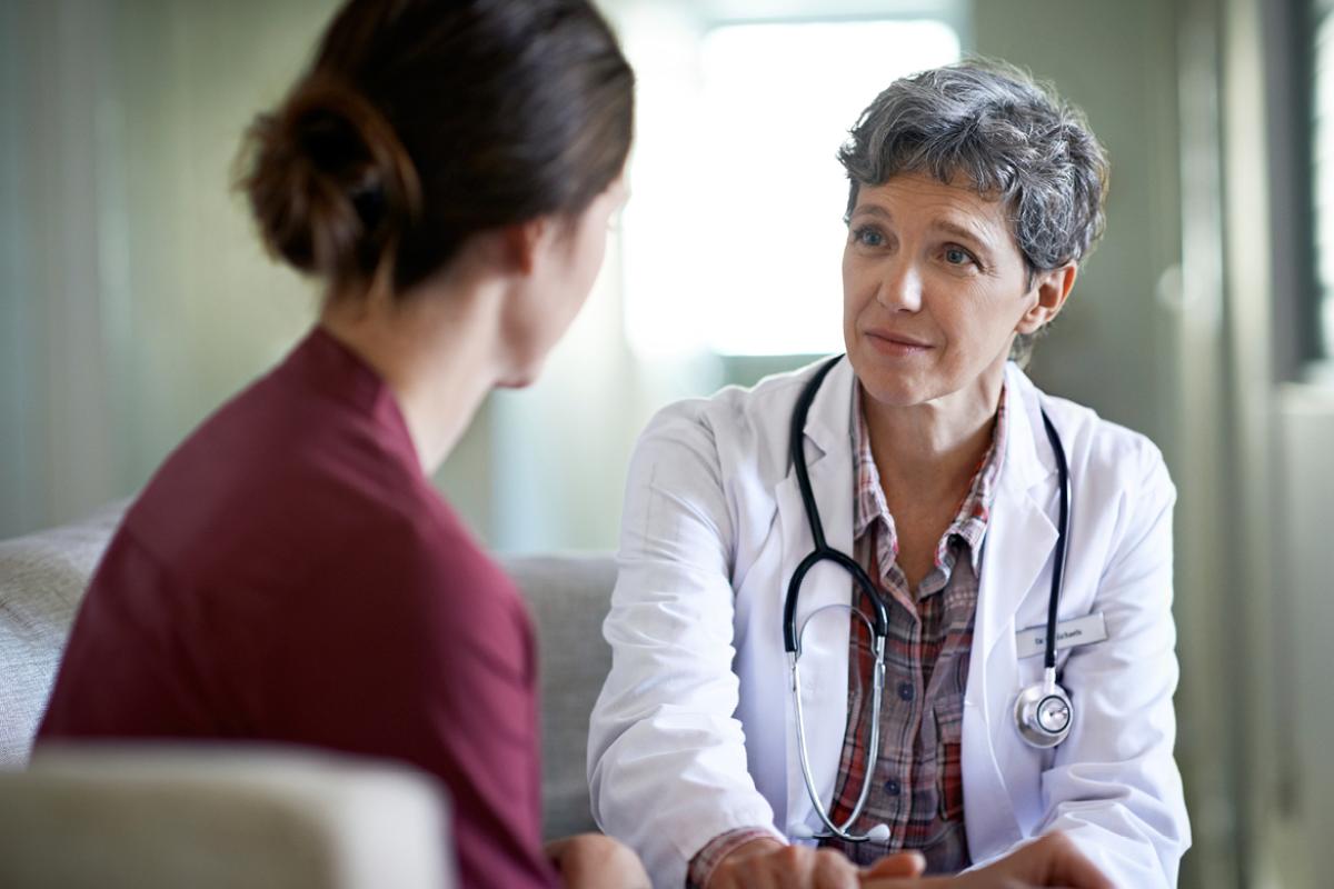 Physician listening with empathy for patient. 