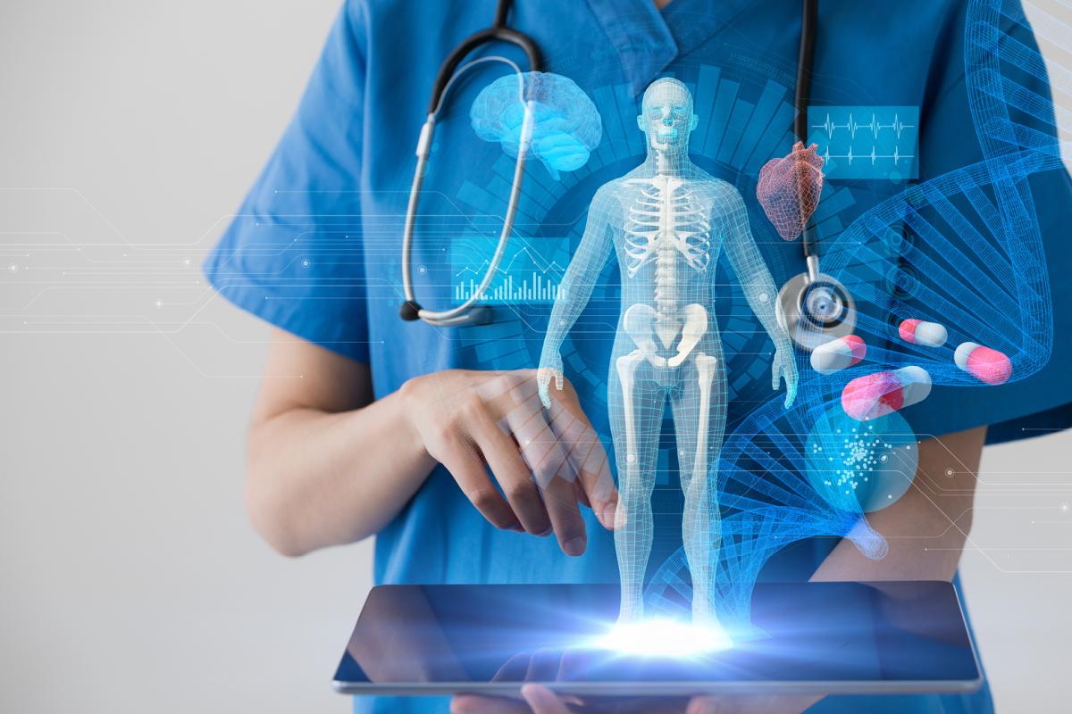 Medical professional in front of hologram