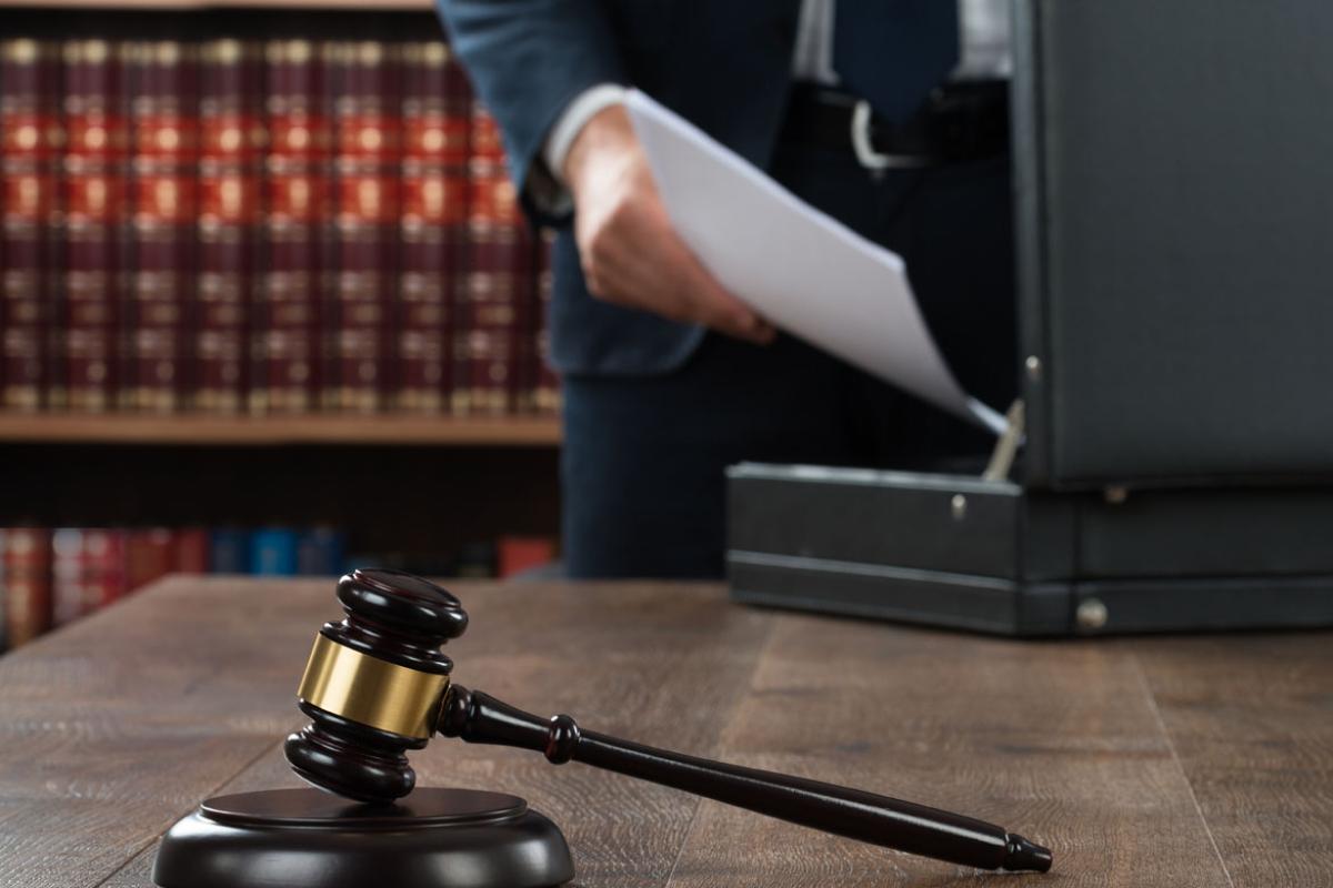 Lawyer in judge chambers, gavel on table