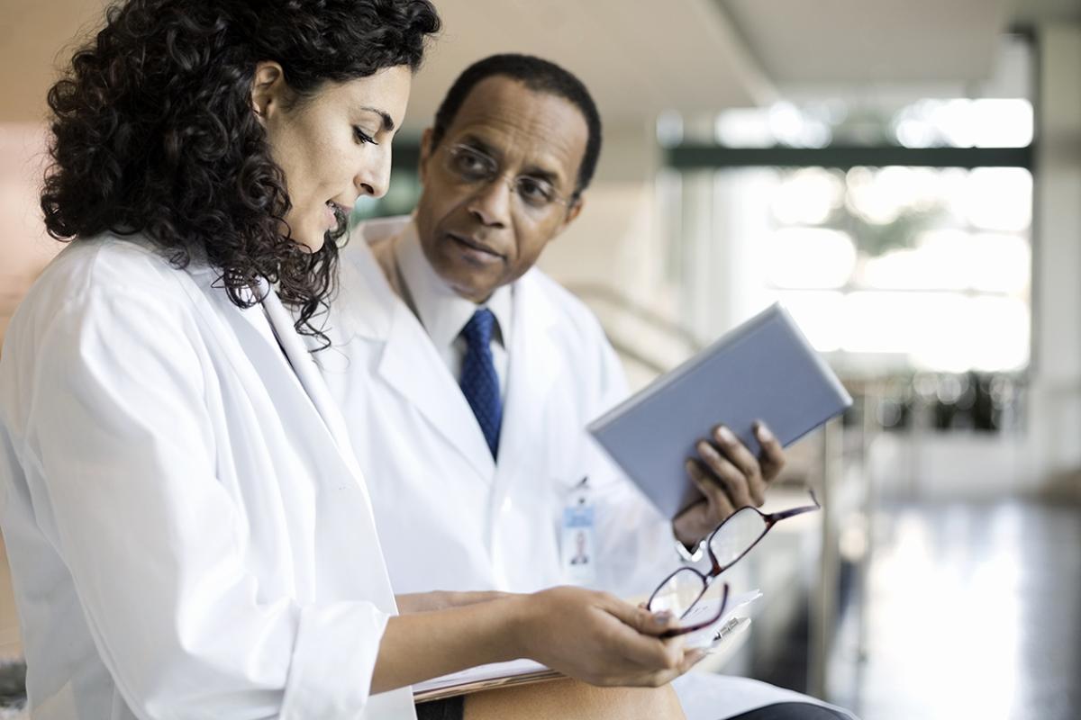 Two physicians having a conversation.