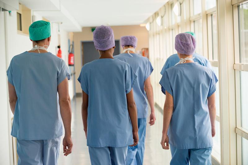 Group of health care workers in a hallway